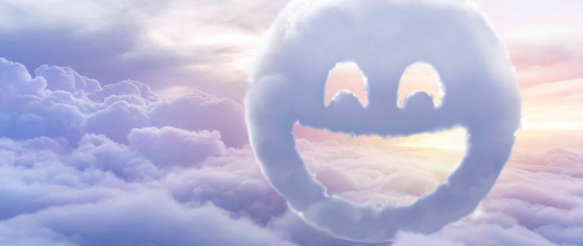 Smiley-shaped cloud above clouds in sunny sky.
