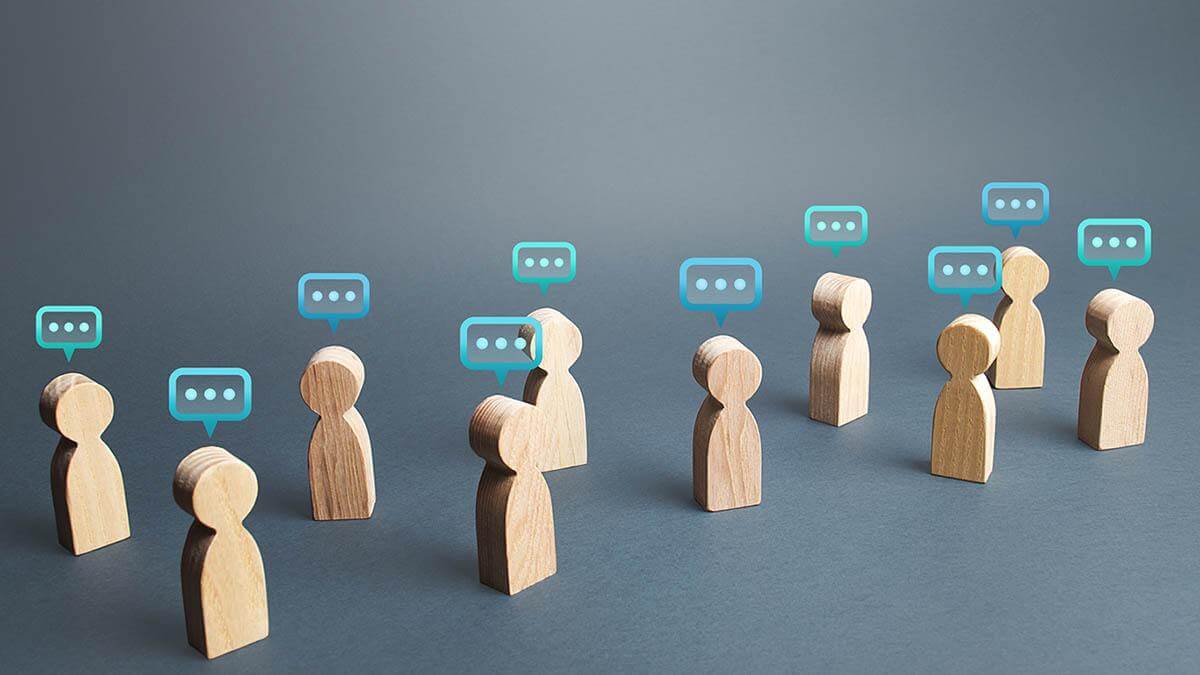 Wooden figures having a virtual discussion