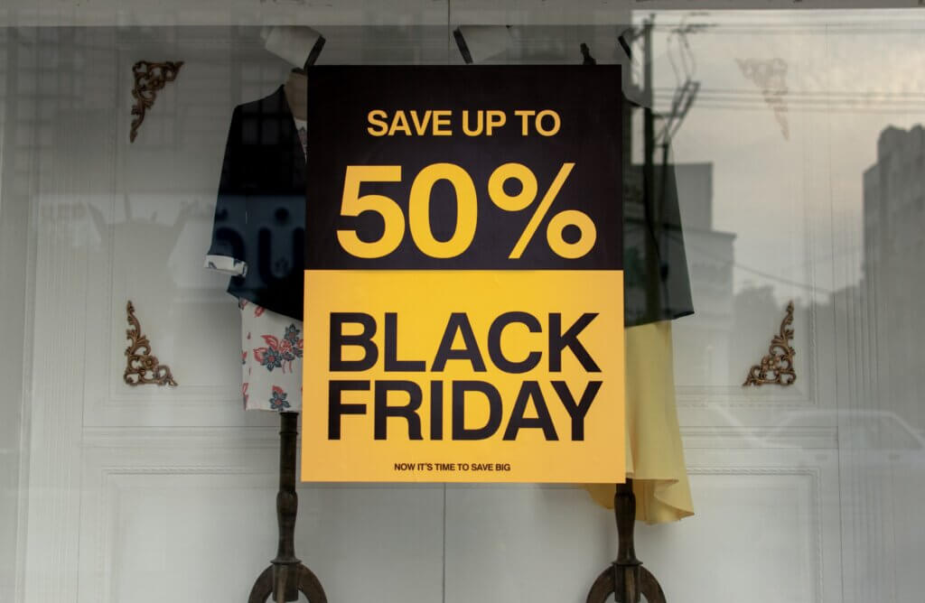 Black Friday 50% off sign in a shop window