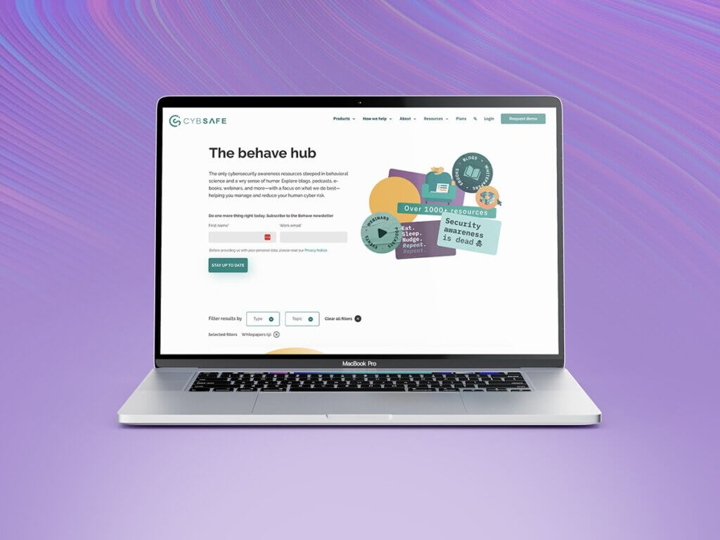 Laptop screen displaying the Cybsafe website against a stylish purple background